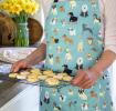 Best in Show Recycled Cotton Apron worn by adult holding baked goods
