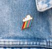 Cloud burst pin badge attached to piece of clothing