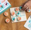 Child playing Wild Wonders tic-tac-toe game