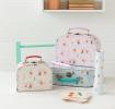 Mimi and Milo storage cases with snap cards, kaleidscope and pencil on table