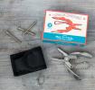 Spirit of Adventure mini multi-tool on workbench with pouch and box