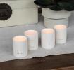 Glossy ceramic tealight holders (set of 4) - LOVE