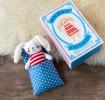 White bunny in a little box for baby and toddler.