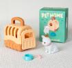 pet carrier with white cat and packaging box in the background