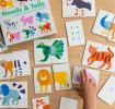 Heads & tails game featuring various animal cards