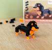 completed sausage dog model kit with the packaging