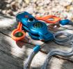 Blue seven-in-one safety whistle with lanyard, magnifying glass and compass