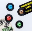 Four colourful mini vinyl record magnets  
