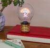 rainbow light bulb showing with the light on