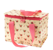 Insulated lunch bag decorated with a floral pattern