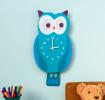 owl-shaped wooden clock with white numbered dial and clock hands