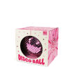 Pink disco ball inside a packaging labelled "DISCO BALL" in bold pink letters