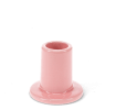 Pink ceramic candle holder with a cylindrical shape and wide flat base