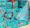 festive friends tissue paper feature illustrations of dogs in winter clothing 