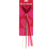 Red heart wand with glittery top and ribbon streamers in packaging