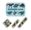 Dinosaur-printed plasters placed beside a matching storage tin featuring dinosaur illustrations