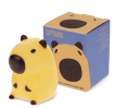 Yellow capybara night light with dark brown ears, shown next to its yellow packaging box 