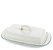 Rectangular white enamel butter dish with a pistachio green rim and a handled lid.