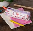 Pencil case in pink featuring colourful illustrations of unicorns, rainbows and stars