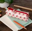 Pencil case in pink featuring colourful illustrations of red cherry print