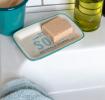 Rectangular ceramic soap dish with a light blue border and printed text 'SOAP'