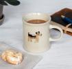 Stoneware mug featuring a dog with handle 