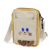 Beige and yellow crossbody bag with a front pocket featuring a smiling face design and two small brown plush feet at the bottom.
