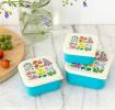 Three plastic snack boxes in turquoise and cream featuring floral pattern