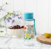 Medium size plastic water bottle with blue lid and carry loop strap floral pattern