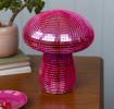 Pink disco mushroom-shaped table lamp with mirrored tiles.