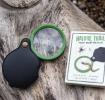 Nature Trail pocket magnifying glass with green frame, black leather case, and illustrated packaging.