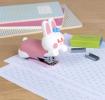 Bunny-shaped stapler with a small box of staples beside it