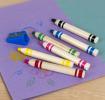 Six jumbo wooden crayons in different colour with a blue sharpener. 