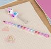 Unicorn stacking crayon with a white unicorn topper and colourful crayon segments.