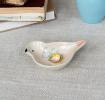 Mini ceramic trinket dish shaped like a bird.