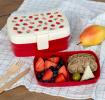 A strawberry‑themed lunch box with an inner tray containing food.