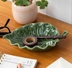 Green ceramic leaf-shaped trinket dish