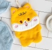 Soft yellow flannel face cloth in a dog shape.