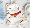 Soft white flannel face cloth in a cat shape design.