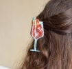 Hair claw clip featuring a zesty Aperitivo Spritz cocktail design, with hints of marbling and translucence. 