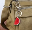 Watermelon slice keyring charm with silver ring and clip.