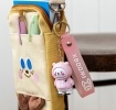 Polar bear bag charm with pink hoodie, silicone wrist strap and silver keyring
