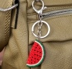 Watermelon slice keyring charm with silver ring and clip.