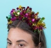 Christmas party headband with colourful tinsel and star.