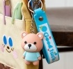Bear bag charm with blue outfit, silicone wrist strap and silver keyring