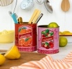 Set of two retro-style storage tins with marmalade and wild strawberry preserve designs