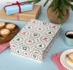 Rectangular storage tin decorated with Christmas tree, baubles, wreaths and candy canes.