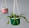 Green seagrass hanging basket with hanging loop.