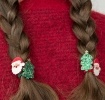 Christmas hairbands featuring Santa faces and glitter Christmas trees
