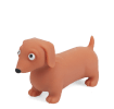 Squeezy squishy toy shaped like a brown sausage dog with floppy ears and a cute face.